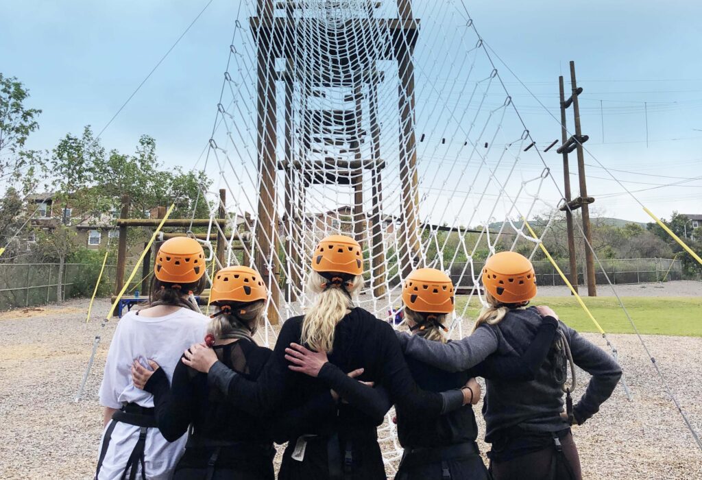 Group participating in a team-building exercise for recovery