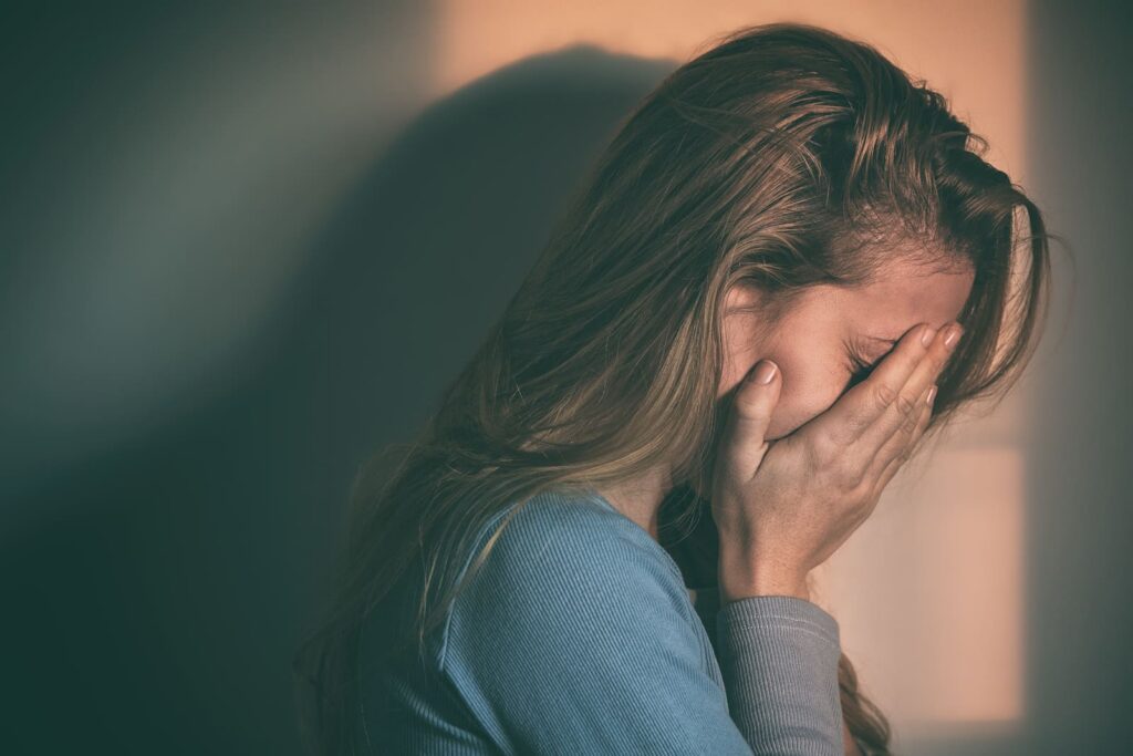 Woman showing signs of Kratom high effects