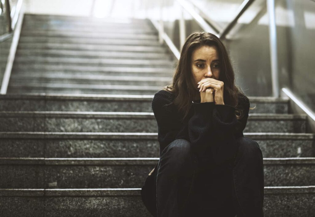 Person struggling with meth addiction and seeking help