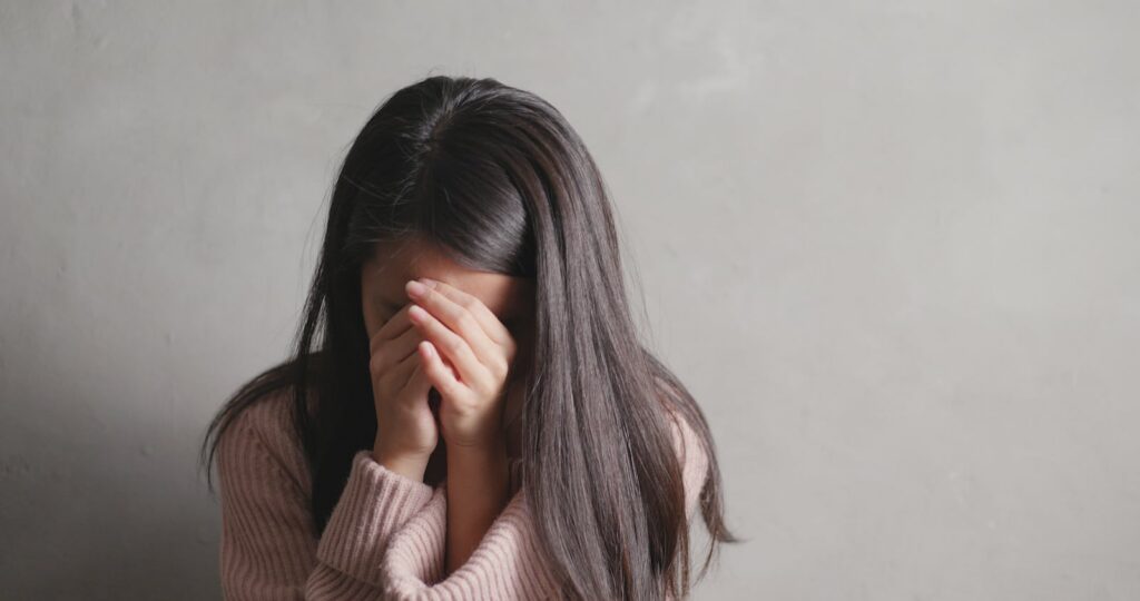 Woman thinking about doing a drug detox at home