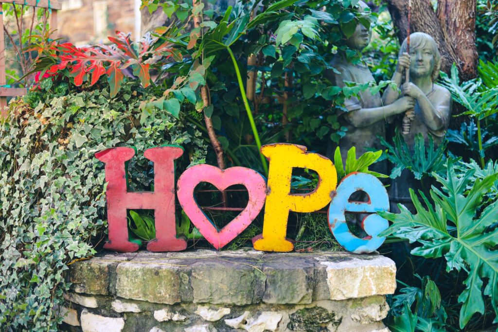 Supportive environment in a halfway house, with people interacting and receiving guidance