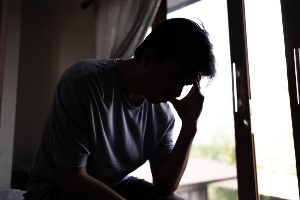 Man experiencing fentanyl withdrawal symptoms