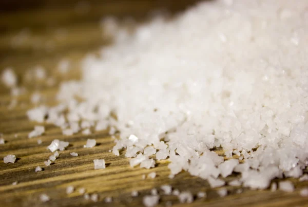 how long does ketamine last? drug crystals on a wooden table top