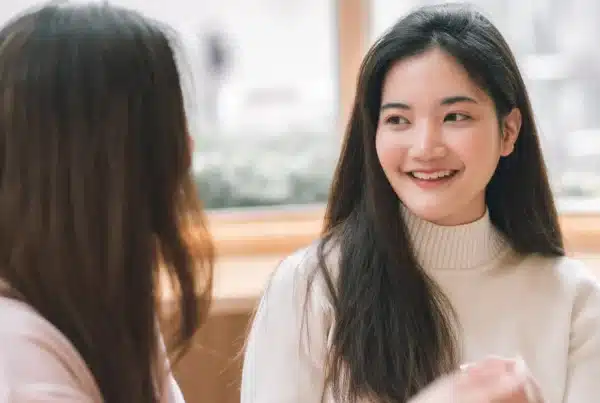 What Is a Sponsor? Two women conversing face to face