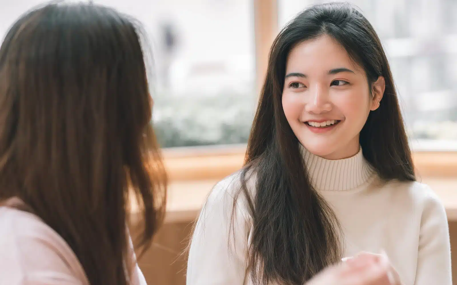 What Is a Sponsor? Two women conversing face to face