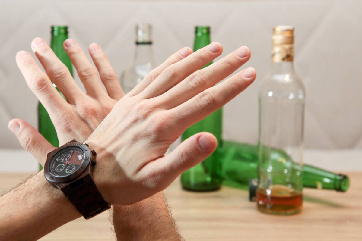 person avoiding drinking alcohol